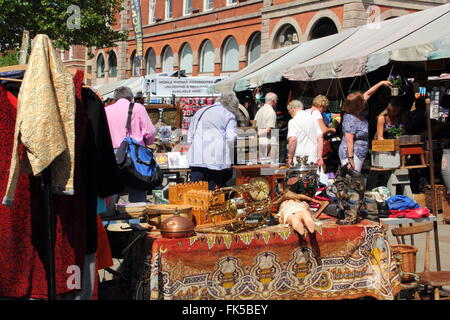 Market Place Rummage Visitors rummage for bargains on the flea market in Market Place in ...