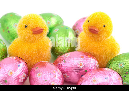 Two little chickens and easter eggs Stock Photo