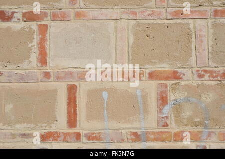 Brick wall with large and small brick Stock Photo