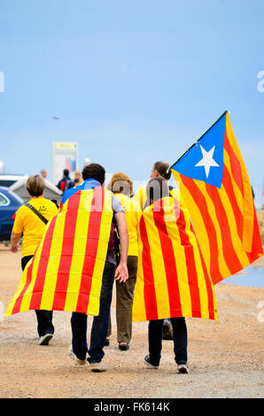 People walking with independence flags of Catalonia. Stock Photo