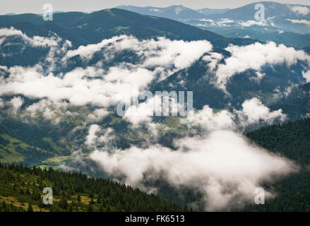 Formation of clouds in the mountains after the rain. Carpathians. Ukraine Stock Photo
