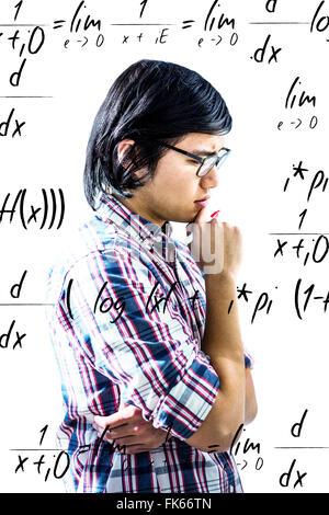 Composite image of thoughtful creative businessman looking at sticky notes Stock Photo