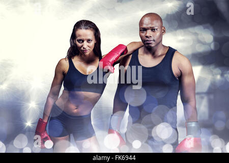 Composite image of portrait of confident boxers Stock Photo