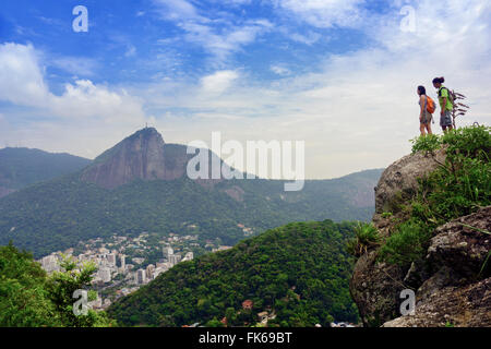Hikers on the Morro dos Cabritos, Copacabana, Rio de Janeiro, Brazil, South America Stock Photo