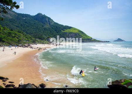 Surfers on Prainha beach, Barra da Tijuca, Rio de Janeiro, Brazil, South America Stock Photo