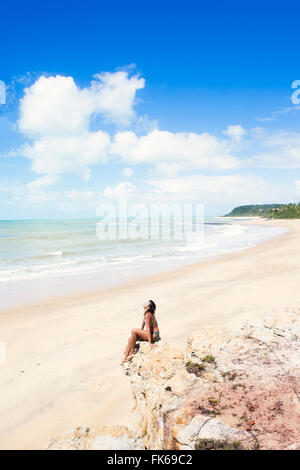 A young woman on Espelho near Trancoso, Bahia, Brazil, South America Stock Photo