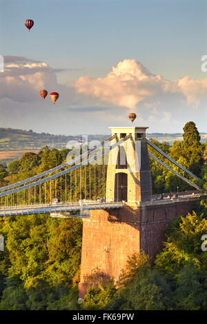 Clifton Suspension Bridge, with hot air balloons in the Bristol Balloon Fiesta in August, Clifton, Bristol, England Stock Photo