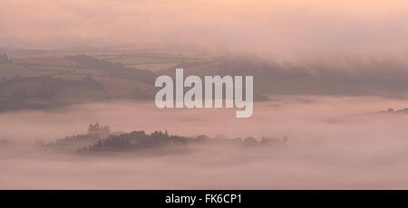 Mist covered rolling countryside at dawn, Dartmoor National Park, Devon, England, United Kingdom, Europe