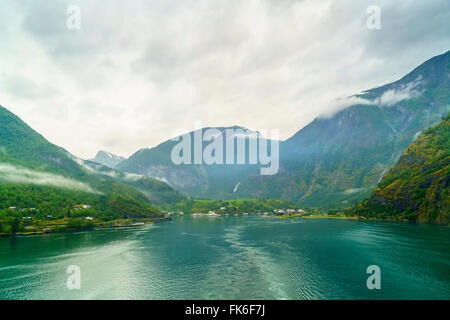 The town of Flam situated at Aurlandsfjord, a branch of Sognefjord, a tourist destination as the Flam Railway, Flamsbana, Norway Stock Photo