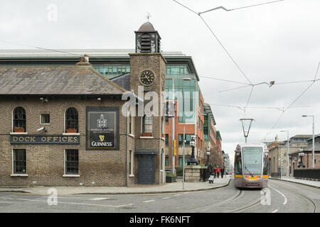 Street scene showing a combination of older buildings, and new development in the IFSC, in North Wall, Dublin, Ireland Stock Photo