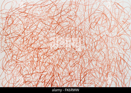 brown crayon doodles on white paper background Stock Photo
