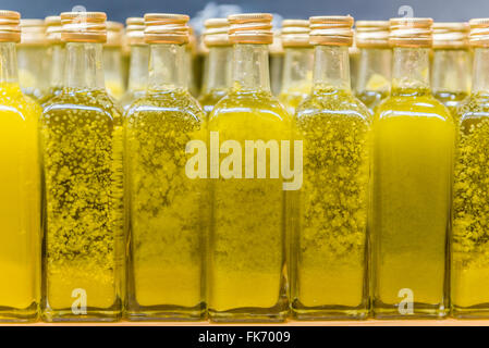 Small bottles of extra virgin olive oil Stock Photo