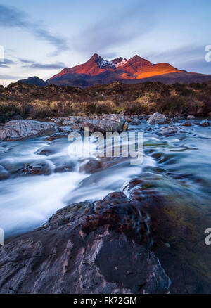 Early red light on the Cuillin Hills from Sligachan, Isle of Skye, Highlands, Scotland, UK Stock Photo