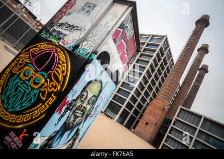 Three chimneys and graffiti in square avenue Paral.lel, Barcelona. Stock Photo