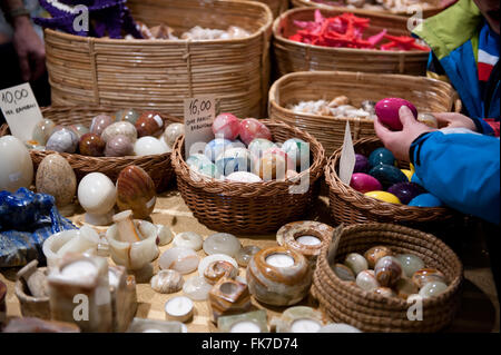 Onyx Easter eggs in wicker bowls, gemstones objects assortment at Warsaw Mineral Expo 2016, 5th March, VI edition event in PKiN Stock Photo