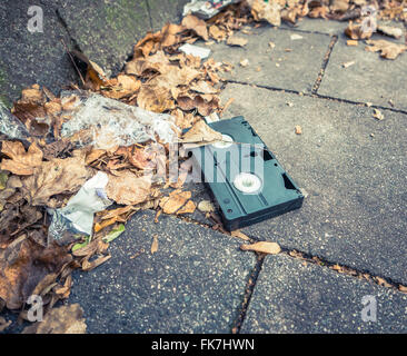 Conceptual Image Of An Abandoned VHS Tape In The Street Stock Photo