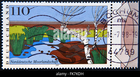 GERMANY - CIRCA 1997: a stamp printed in Germany shows North German Moorland, Scenic Region, circa 1997 Stock Photo