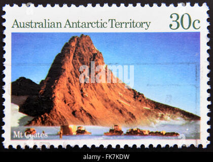 AUSTRALIA - CIRCA 1984: a stamp printed in the Australian Antarctic Territory shows Dog Team, Mt Coates, circa 1984 Stock Photo