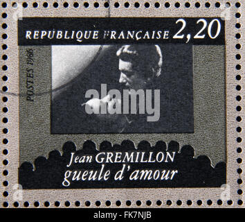 FRANCE - CIRCA 1986: stamp dedicated to centenary of the French cinema shows Jean Gremillon 'Love Hangover', circa 1986 Stock Photo