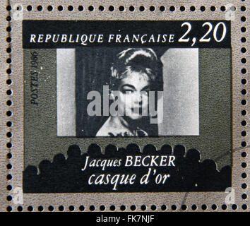 FRANCE - CIRCA 1986: stamp dedicated to centenary of the French cinema shows Jacques Becker 'Casque d'Or', circa 1986 Stock Photo