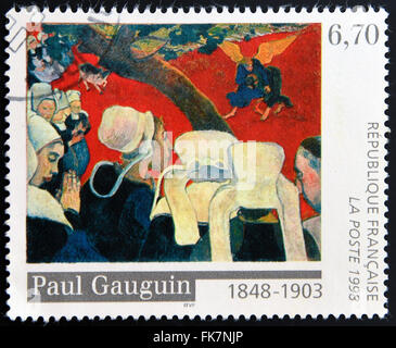 FRANCE - CIRCA 1998: A stamp printed in France shows the work 'Vision after the Sermon' by Paul Gauguin, circa 1998 Stock Photo