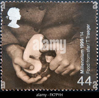 UNITED KINGDOM - CIRCA 1999: A stamp printed in Great Britain shows Food from afar, T Traeger, circa 1999 Stock Photo