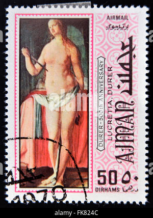 AJMAN - CIRCA 1970: a stamp printed in Ajman shows Lucretia, Painting by Albrecht Durer, circa 1970 Stock Photo