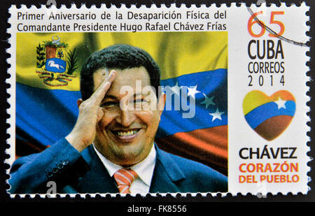 CUBA - CIRCA 2014: A stamp printed in Cuba shows Hugo Rafael Chavez (1954-2013), President of Venezuela, circa 2014 Stock Photo