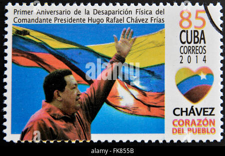 CUBA - CIRCA 2014: A stamp printed in Cuba shows Hugo Rafael Chavez (1954-2013), President of Venezuela, circa 2014 Stock Photo