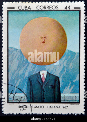 CUBA - CIRCA 1968: Stamp printed in Cuba commemorative to May Salon, 1967, shows The Art of Living by R. Magritte, circa 1968 Stock Photo