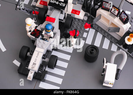 Tambov, Russian Federation - June 24, 2015 Lego MP4-29 race car in fully equipped convertible McLaren Mercedes Pit Stop. Stock Photo