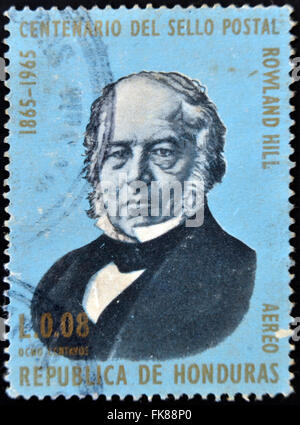 HONDURAS - CIRCA 1965: A stamp printed in Honduras shows Sir Rowland Hill, circa 1965 Stock Photo
