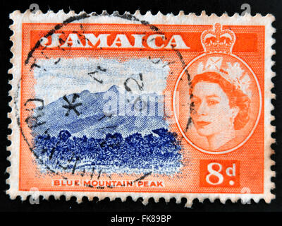 JAMAICA - CIRCA 1962: A stamp printed in Jamaica shows blue mountain peak, circa 1962 Stock Photo