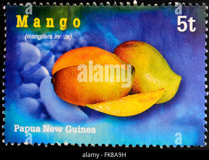 PAPUA NEW GUINEA - CIRCA 2000: A stamp printed in Papua shows mango, circa 2000 Stock Photo