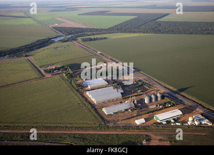 Aerial view of plantation of corn and grain silos on Highway BR-163 highway in the countryside Stock Photo