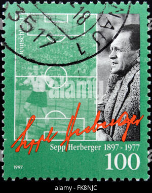 GERMANY - CIRCA 1997: A stamp printed in Germany shows Sepp Herberger- German football player and manager, circa 1997 Stock Photo