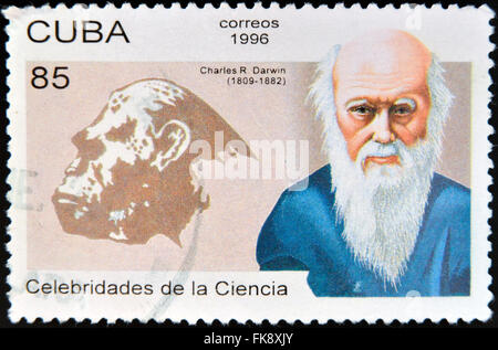 CUBA - CIRCA 1996: a postage stamp printed in Cuba shows an image of Charles Darwin, circa 1996. Stock Photo