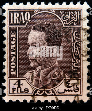 IRAQ - CIRCA 1934: A stamp printed in Iraq shows Ghazi bin Faisal was the King of the Hashemite Kingdom of Iraq, circa 1934 Stock Photo