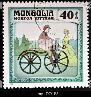 MONGOLIA - CIRCA 1982: stamp printed in Mongolia shows retro bike, circa 1982 Stock Photo