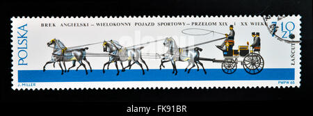 POLAND - CIRCA 1965: a stamp printed in Poland shows old carriage, circa 1965 Stock Photo