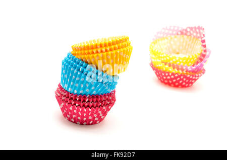 Stack of colorful cupcake cases Stock Photo