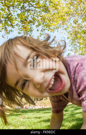 LOS ANGELES, CA – JULY 26: Young girl playing in the park in Los Angeles, California on July 26, 2005. Stock Photo