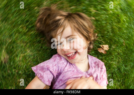 LOS ANGELES, CA – JULY 26: Young girl playing in the park in Los Angeles, California on July 26, 2005. Stock Photo