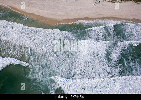 Aerial view of the detail of the breaking waves at Praia da Barra Barra da Tijuca Stock Photo