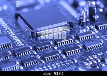 Blue Electronic Circuit board with microprocessor Stock Photo