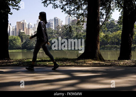 Woman exercising in the park Aclimacao - Aclimacao neighborhood - downtown Stock Photo