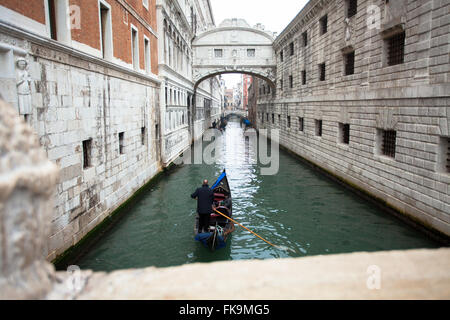 Venice, Italy, gondola along a canal passing under the famous Bridge of Sighs (Ponte dei Sospiri).