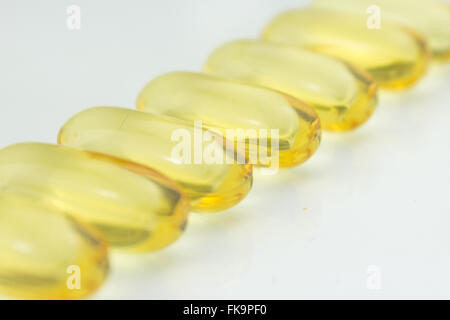 fish oil pills, omega 3 capsules on white background Stock Photo