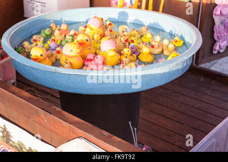 Lots of rubber ducks floating for play with on fair Stock Photo