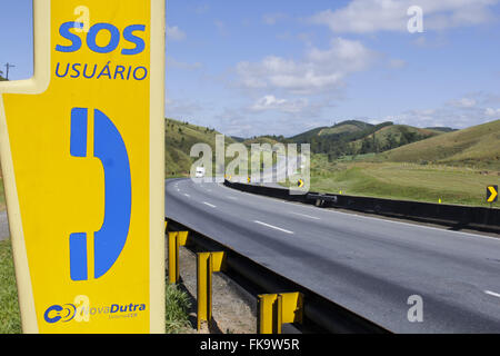 Telephone Emergency SOS on Presidente Dutra highway BR-116 Km 34 Stock Photo